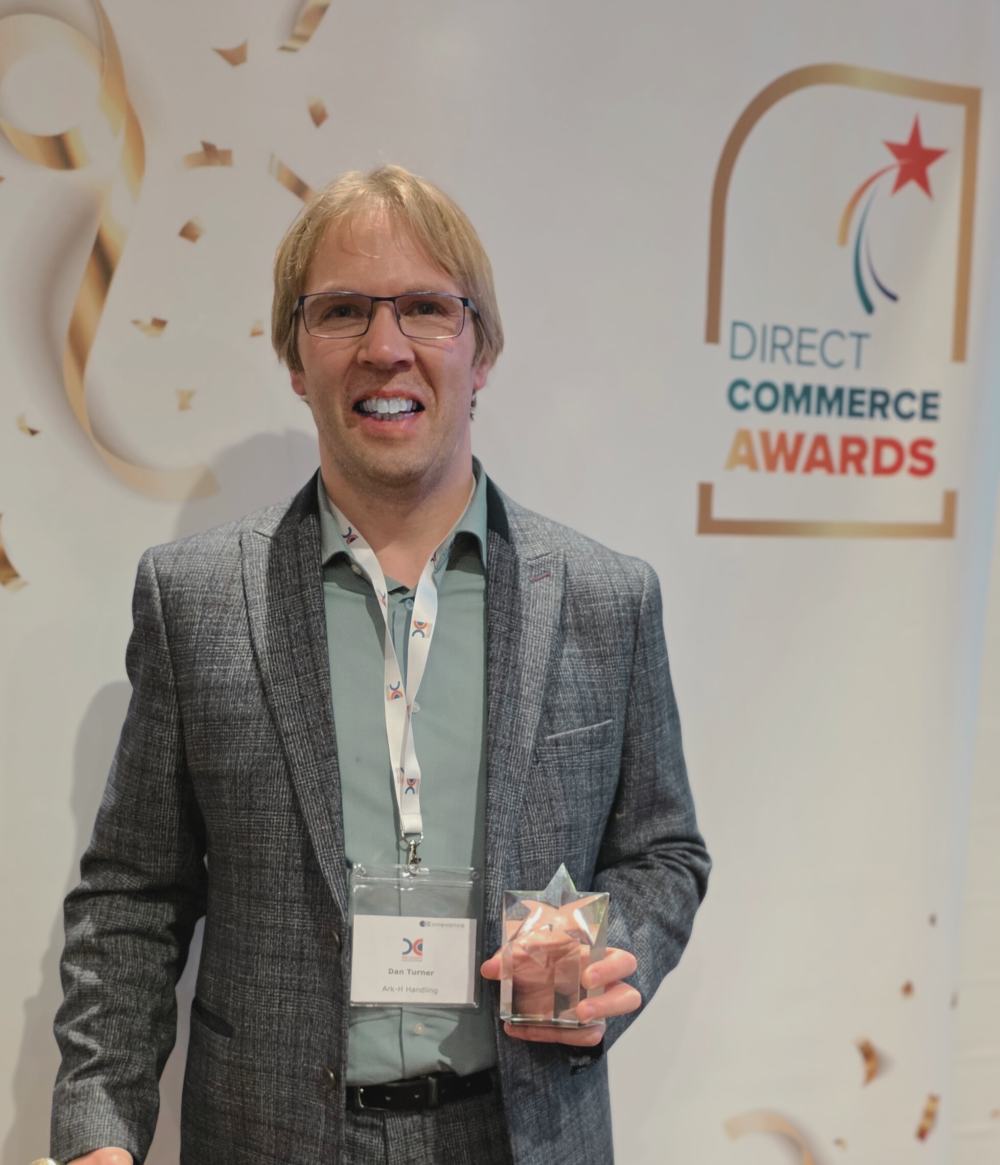 Ark-H's Client Services Director (Dan) collecting the award!